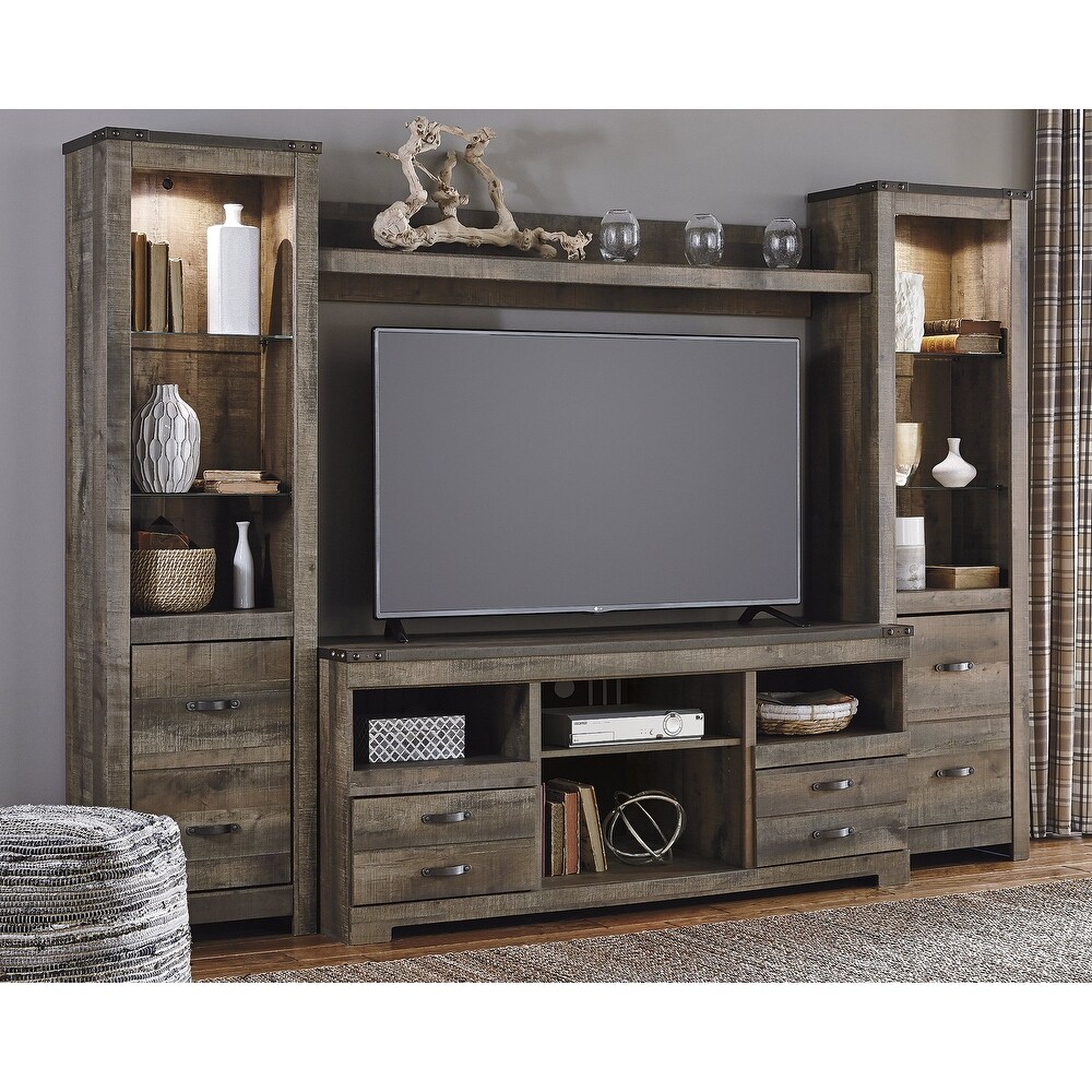 Signature Design by Ashley Trinell Brown 4 Piece Entertainment Center   104.5\