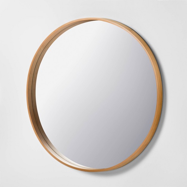 Round Wood Framed Wall Mirror With Magnolia