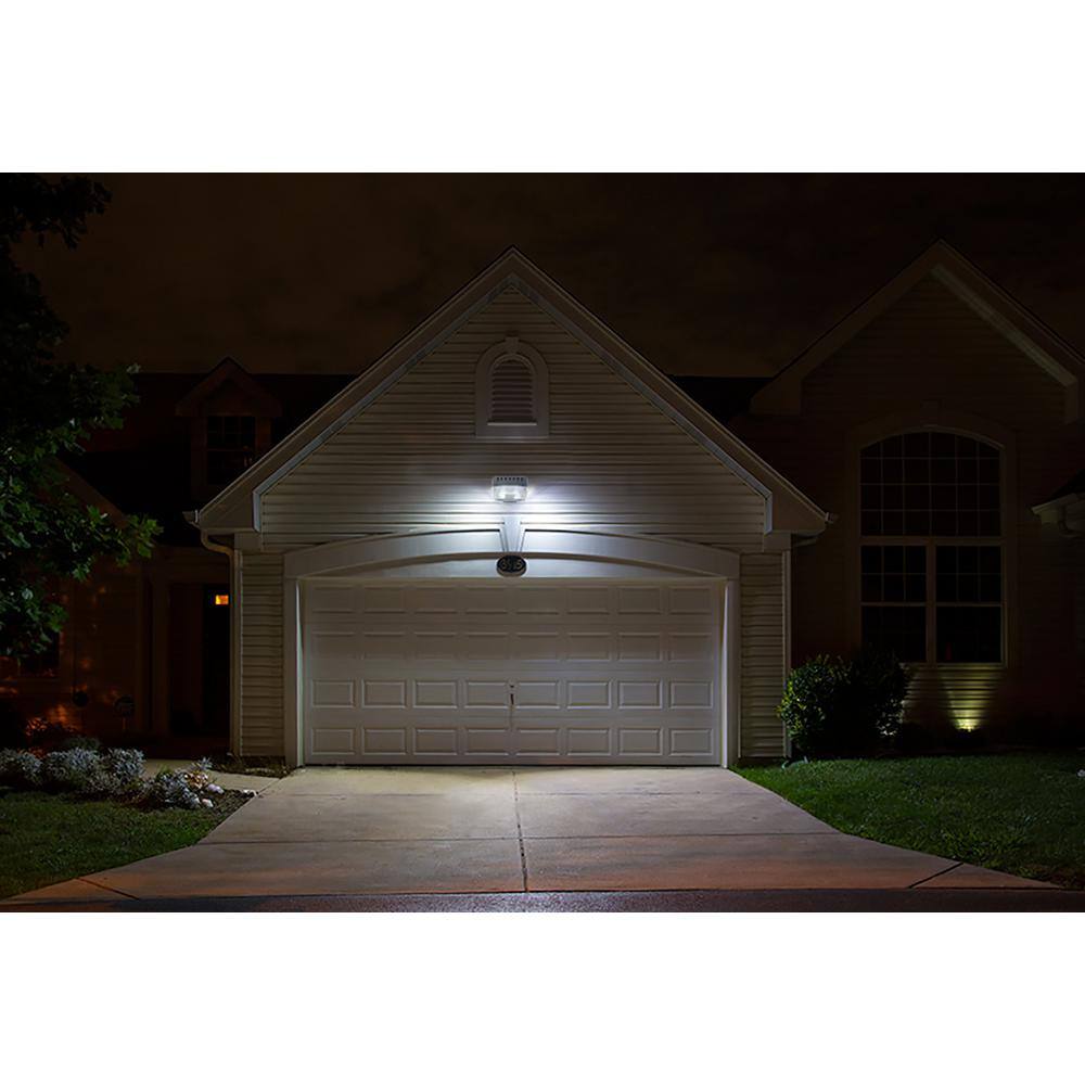 LUTEC Bronze Outdoor Integrated LED Dusk-to-Dawn Flood Light 6301S-PHO