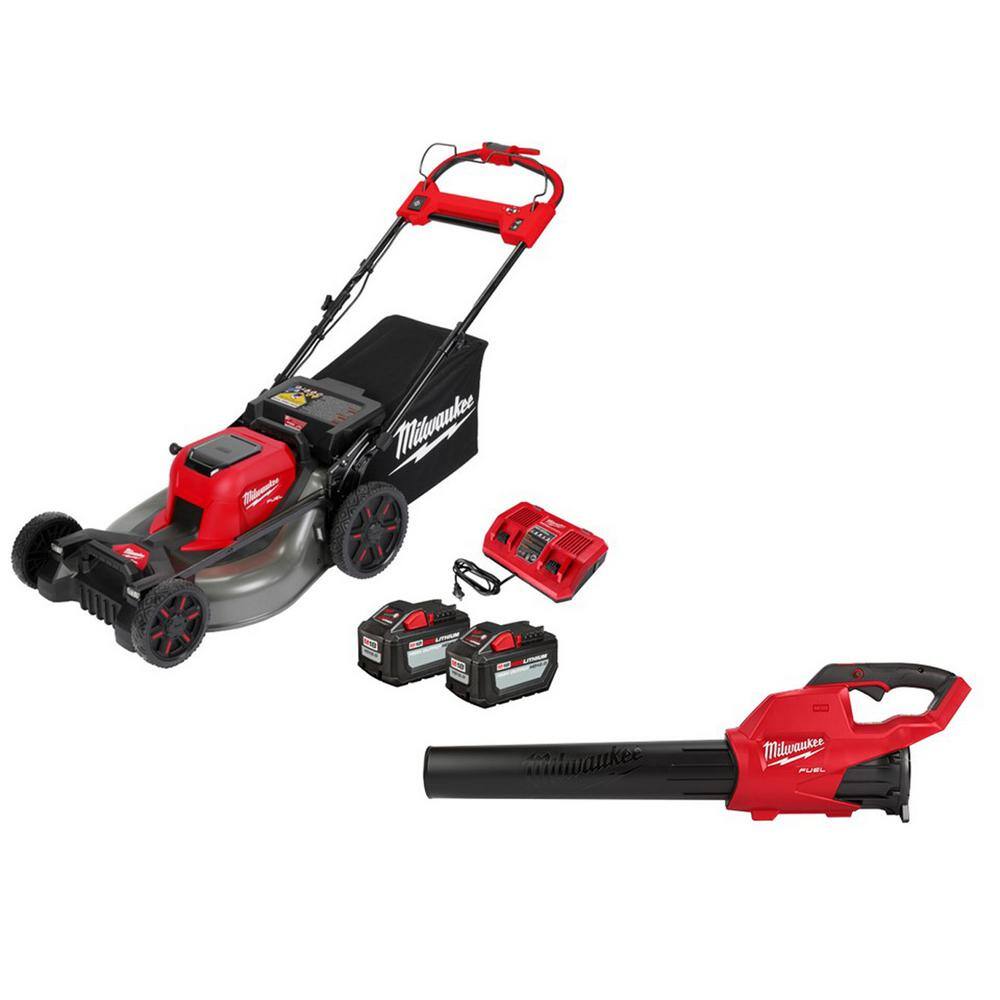 MW M18 FUEL Brushless Cordless 21 in. Dual Battery Self-Propelled Lawn Mower w Blower  (2) 12.0Ah Batteries 2823-22HD-2724-20