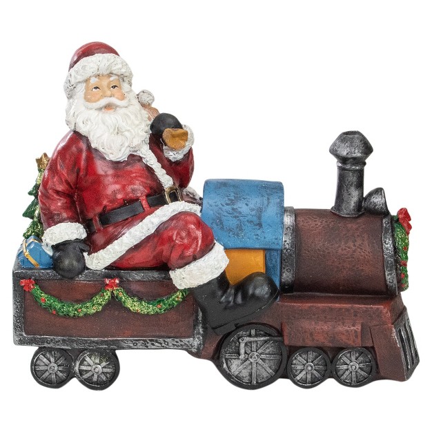 Red And Blue Santa On A Train Christmas Tabletop Decoration