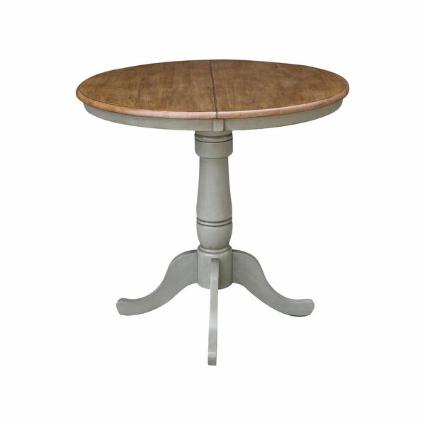 36 in. Round Top 29.3 in. H Pedestal Dining Table With 12 in. Leaf?