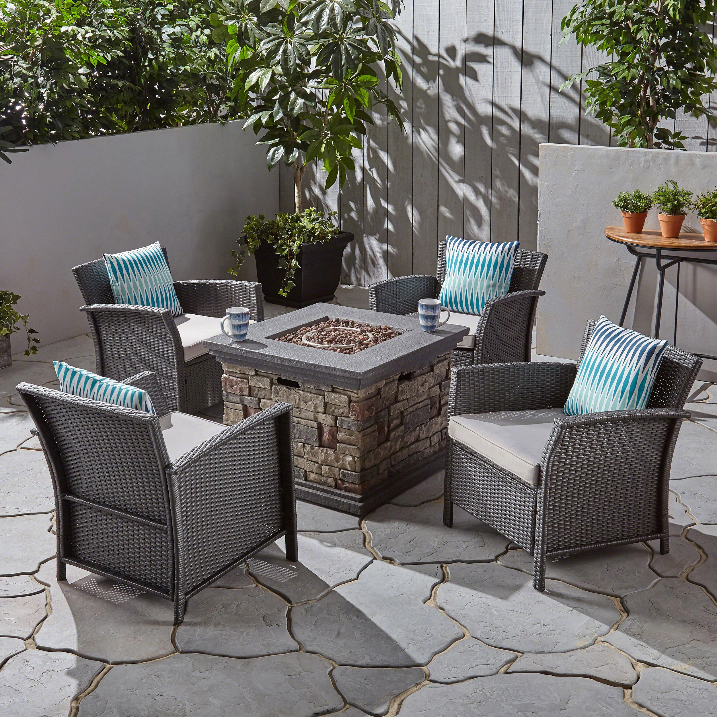 Laiah Outdoor 4 Piece Wicker Club Chair Chat Set with Fire Pit