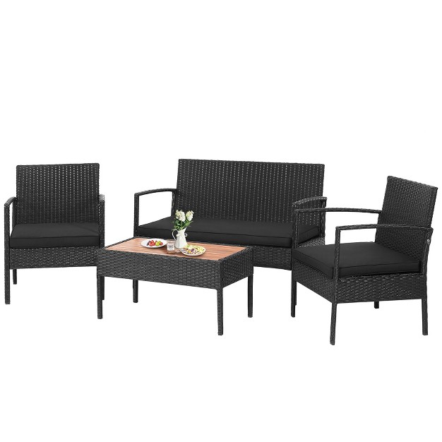 Costway 4pcs Patio Rattan Furniture Set Cushioned Chair Wooden Tabletop Black