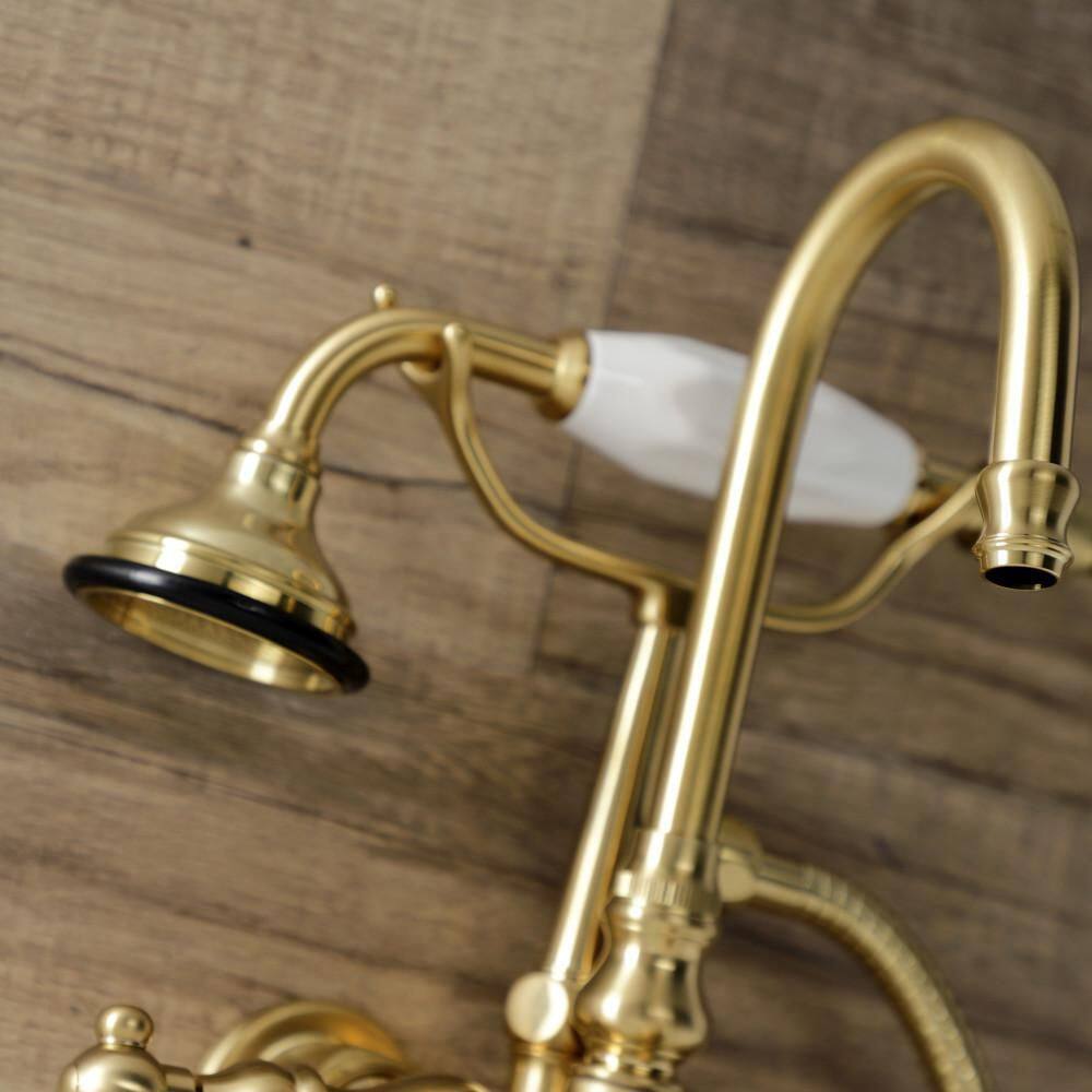 Kingston Brass Aqua Vintage 3-Handle Wall-Mount Clawfoot Tub Faucets with Hand Shower in Brushed Brass HAE7T7