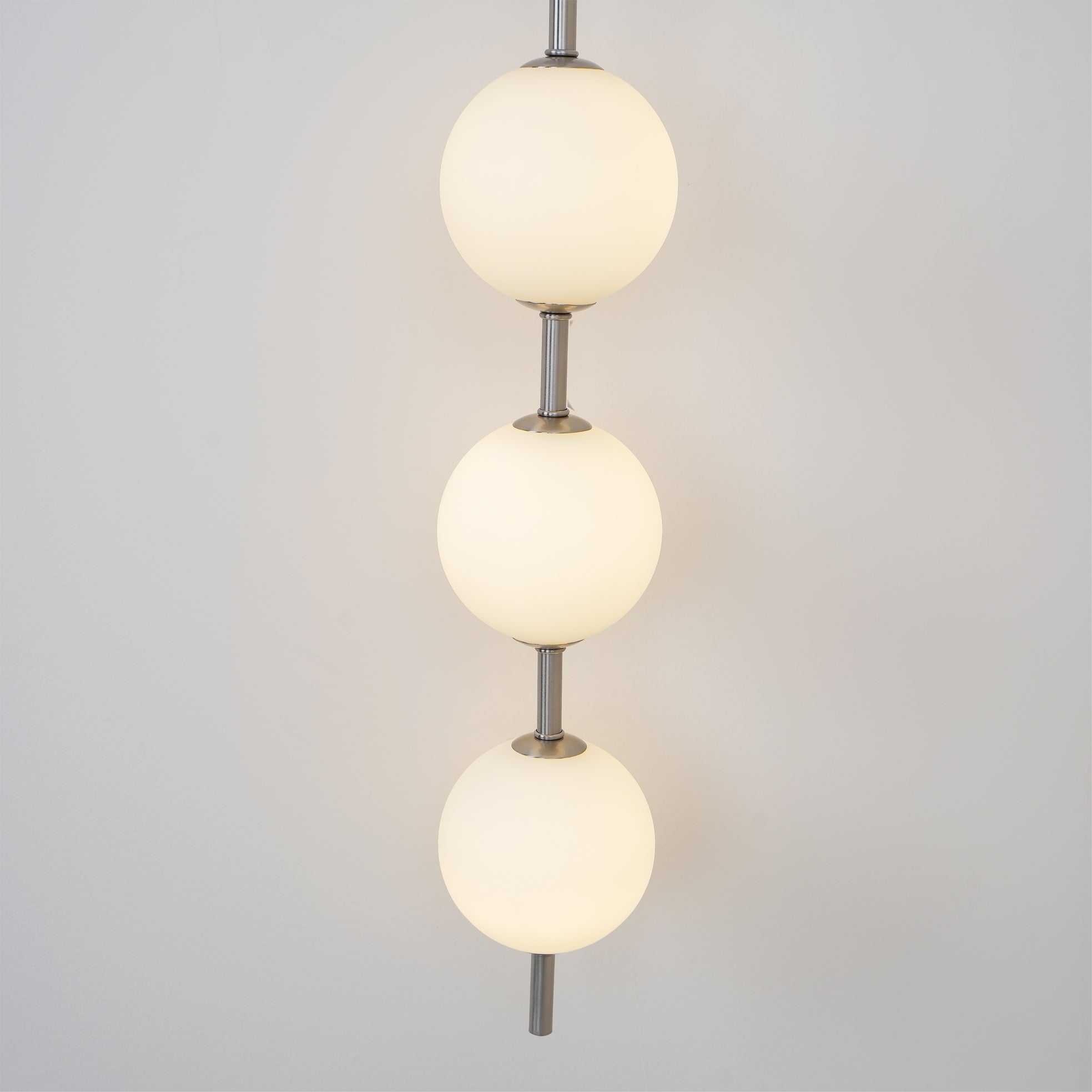 Vertical Globe Plug-in Wall Lamp