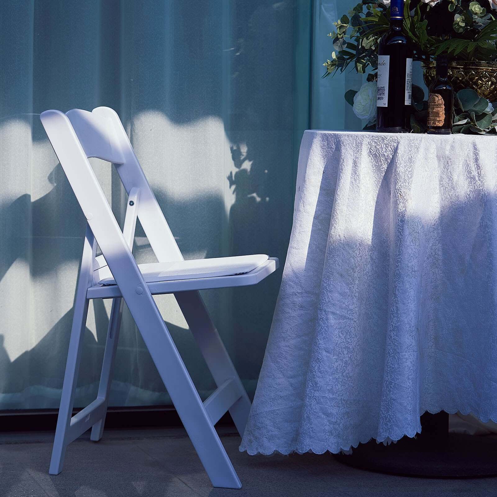 White Resin Folding Chair With Vinyl Padded Seat For Weddings, Indoor or Outdoor Events