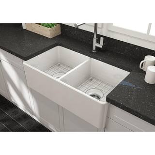 Glacier Bay Farmhouse Apron-Front Fireclay 33 in. Double Bowl Kitchen Sink in White with Bottom Grid 3ABRB-39-001