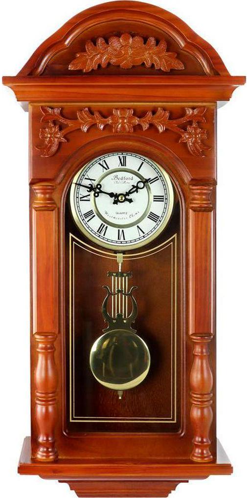 Bedford Clock Collection 27.5 Antique Chiming Wall Clock with Roman Numerals in a Padauk Oak Finish