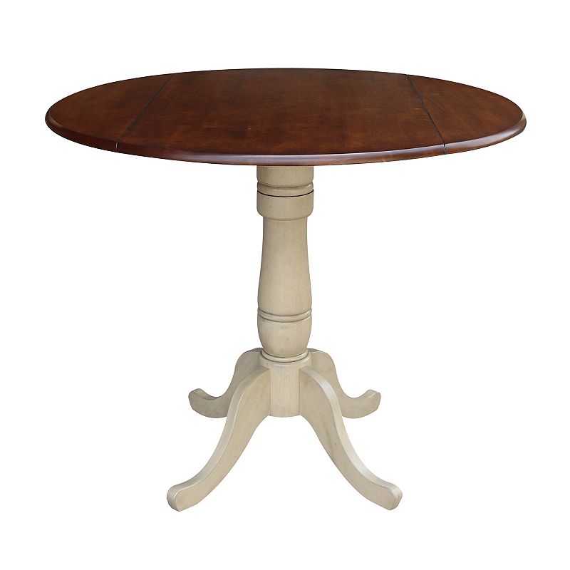 International Concepts Round Pedestal Dual Drop Leaf Dining Table