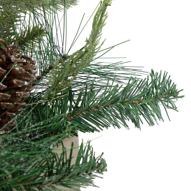 Mixed Pine With Pine Cones And Berries Christmas Floral Arrangement