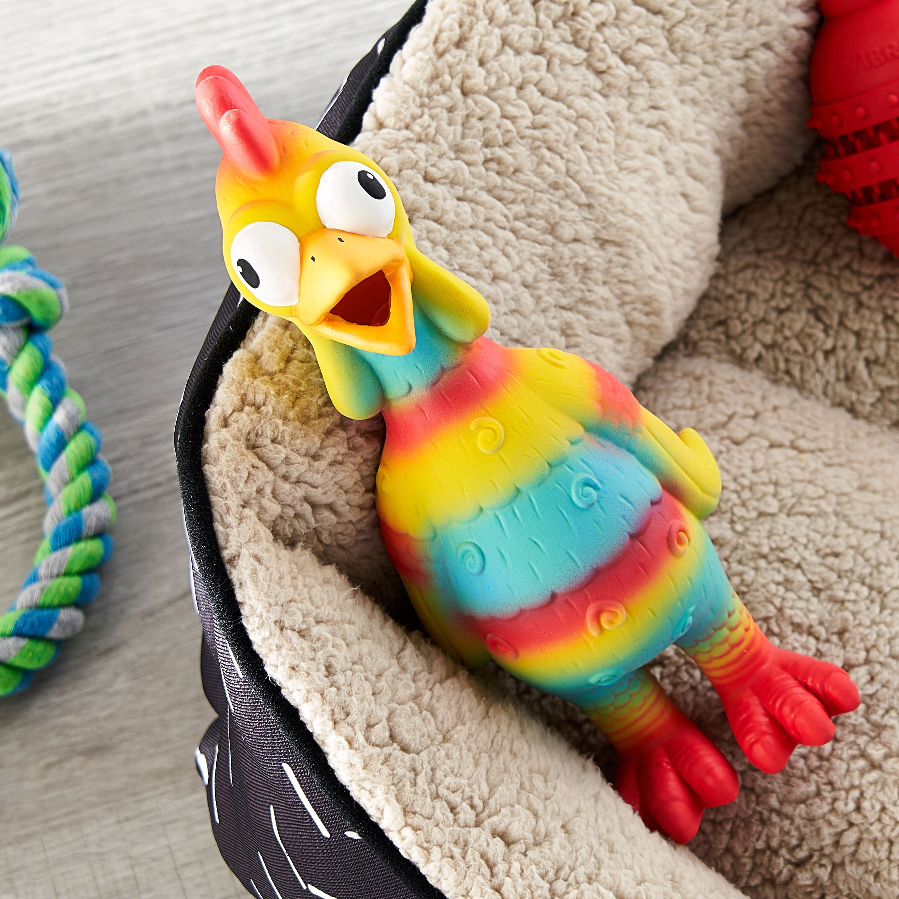 Vibrant Life Playful Buddy Tie Dye Chicken Dog Toy， Chew Level 2， with Squeaker.