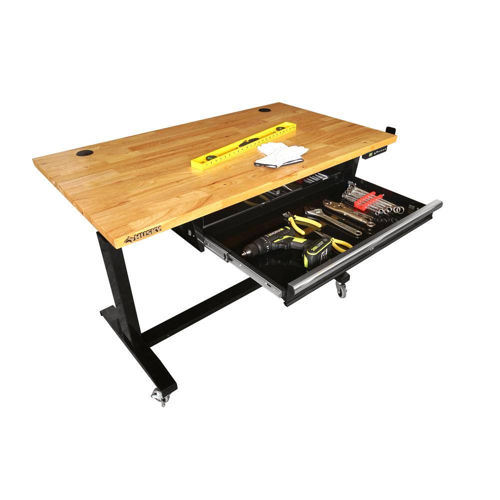 Husky 52 in.W x 30 in. D Steel 1-Drawer Power Adjustable Height Solid Wood Top Workbench Table in Black HOET5201B11XUS