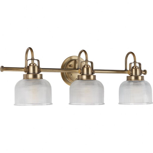 Progress Lighting Archie Collection 3 light Vanity Fixture Vintage Brass With Prismatic Glass Shade