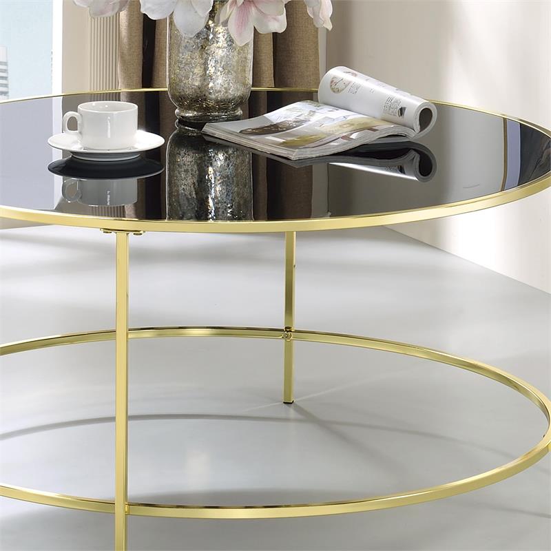 Bowery Hill Contemporary Glass Top Round Coffee Table in Brass