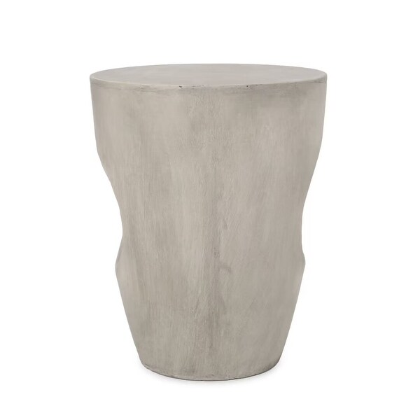 Modern Outdoor side table，with its round tabletop and drum silhouette