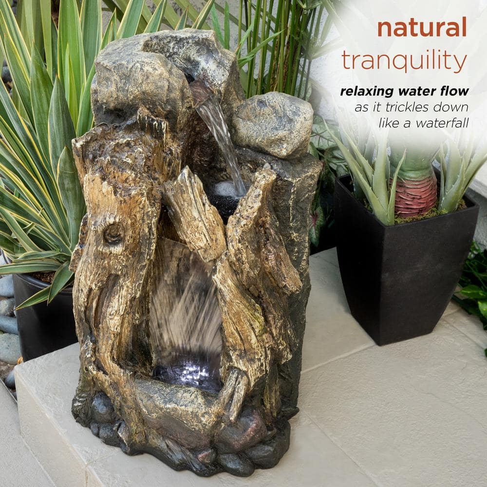 Alpine Corporation 22 in. Tall Outdoor Rainforest Tree Trunk and Stone Waterfall Fountain with LED Lights WIN270S