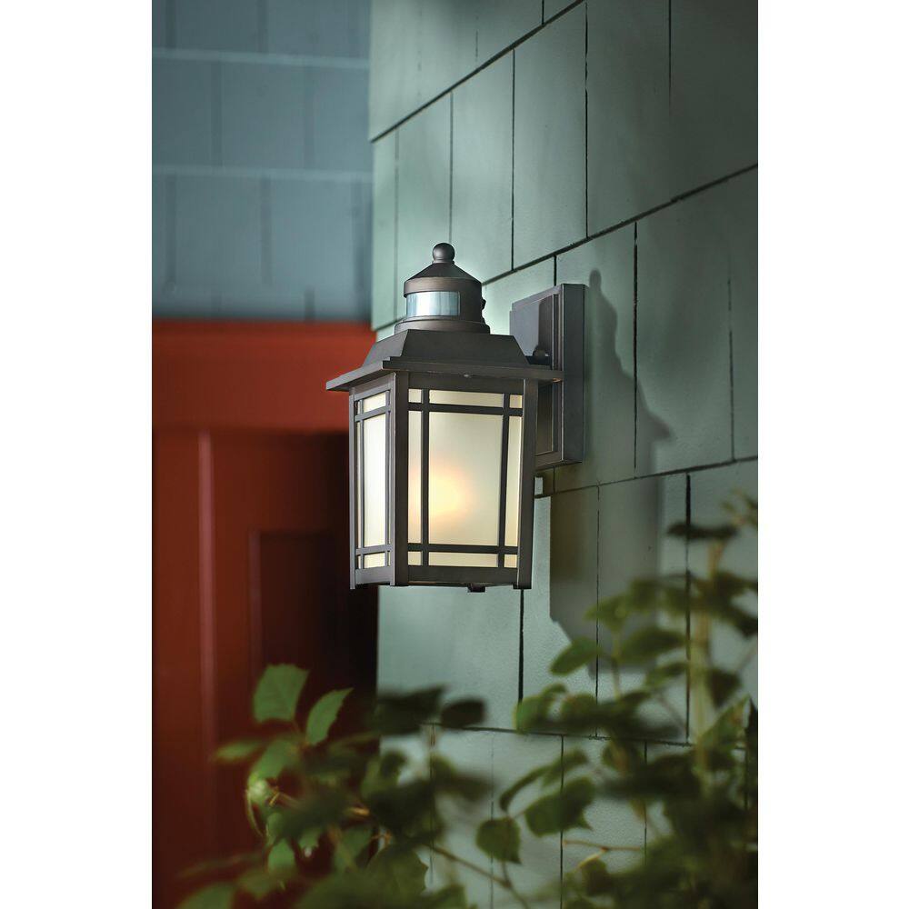 Home Decorators Collection Port Oxford 1-Light Oil Rubbed Chestnut Motion Sensing Outdoor Wall Mount Lantern 22231