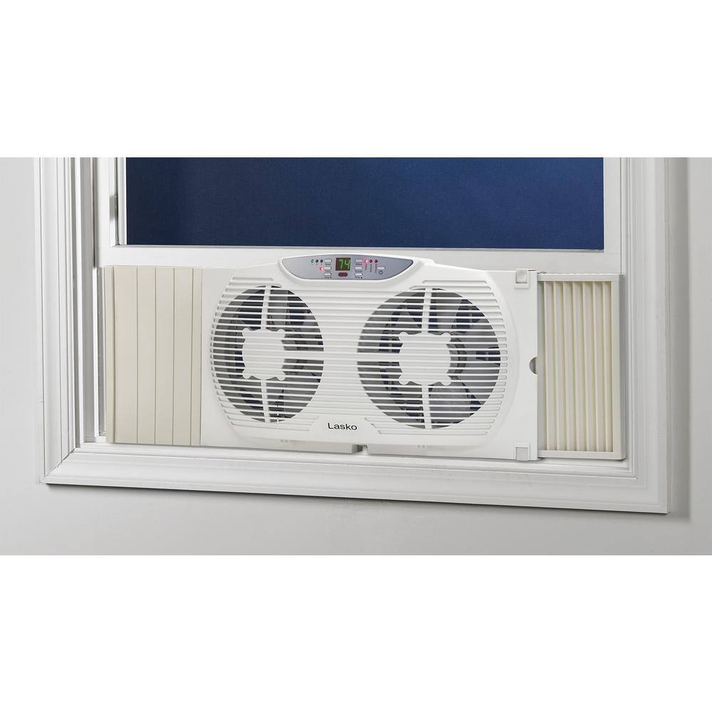 Lasko 9 in. Remote Control Electronically Reversible Twin Window Fan with Thermostat W09550