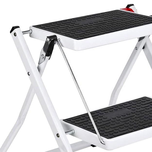 Delxo Portable Collapsible Lightweight Alloy Steel 2 Step Mini Stool Stepladder With Anti Slip Carry Hand Grip And Wide Pedal For Indoor Use White