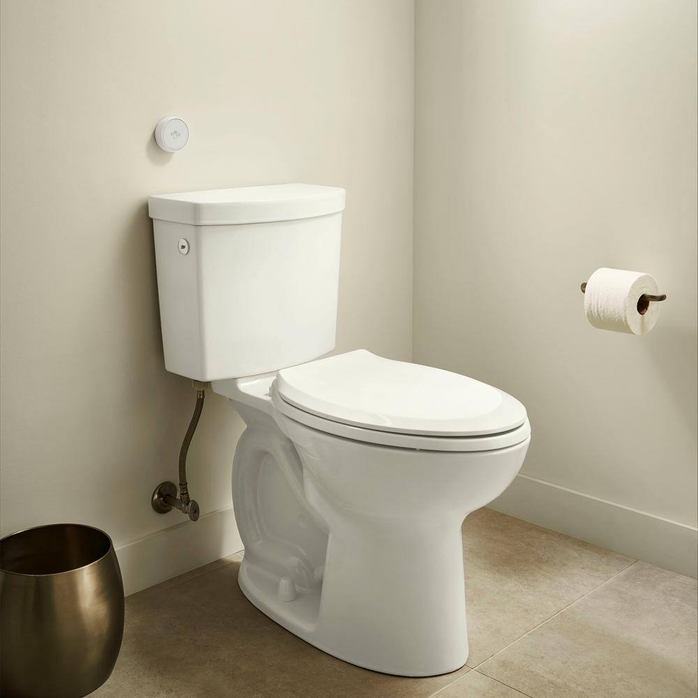 American Standard Cadet Touchless 2-piece 1.28 GPF Single Flush Elongated Toilet in White Seat Included 580AA709.020