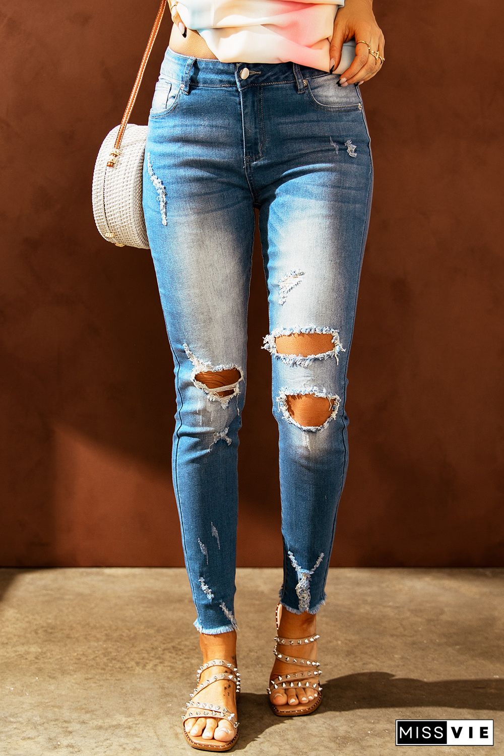 Faded Mid High Rise Jeans with Holes