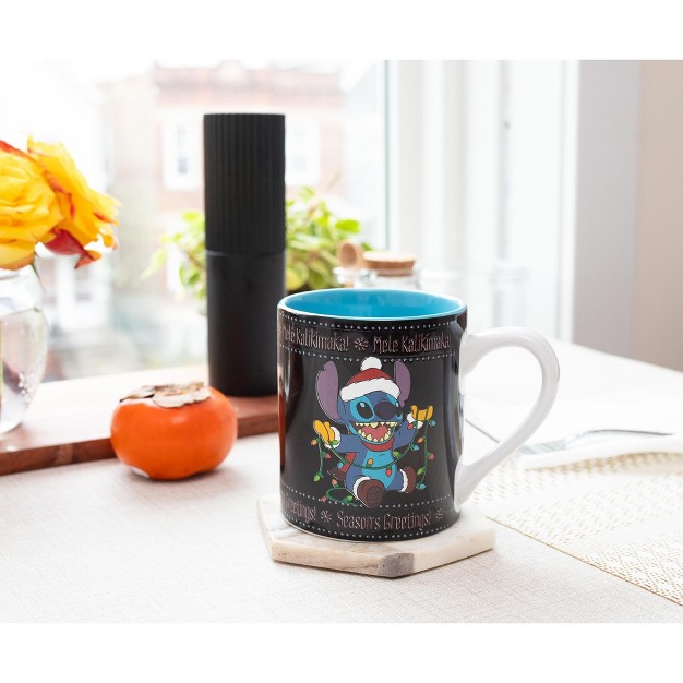 Silver Buffalo Disney Lilo amp Stitch Holiday Sweater Heat reveal Ceramic Mug Holds 14 Ounces