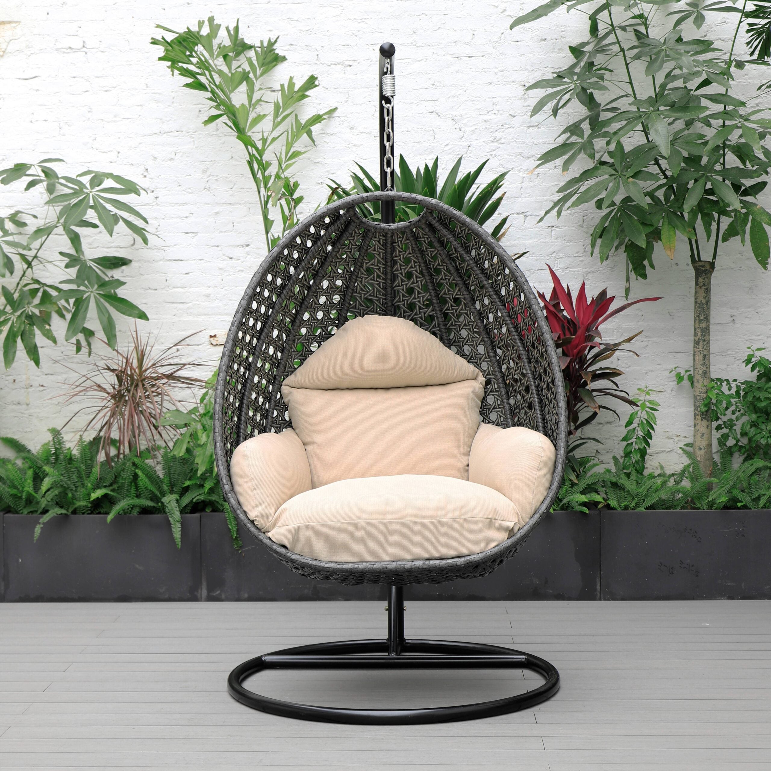 LeisureMod Charcoal Wicker Indoor Outdoor Bedroom Patio Hanging Egg Swing Chair with Stand and Cushion Beige