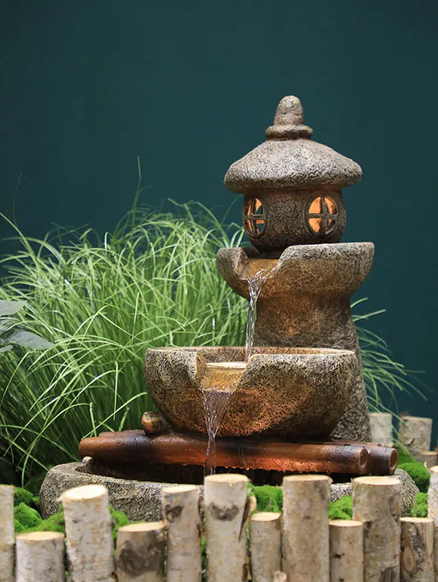 water fountain Kumquat big cylinder birch fence fence bamboo stone spring flowing water generous stone lamp artificial landscape