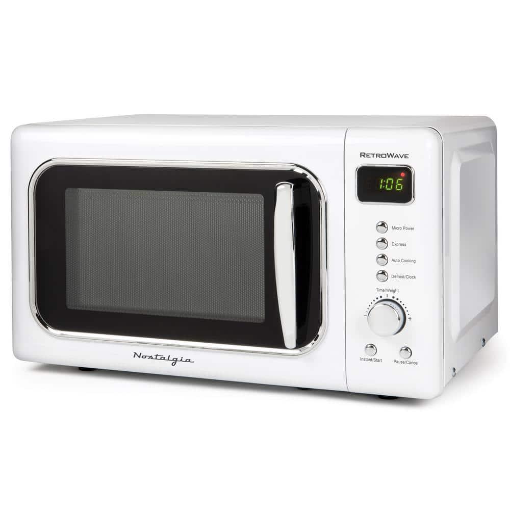 Nostalgia 07 cu ft Countertop Microwave in Retro White with Express Cooking