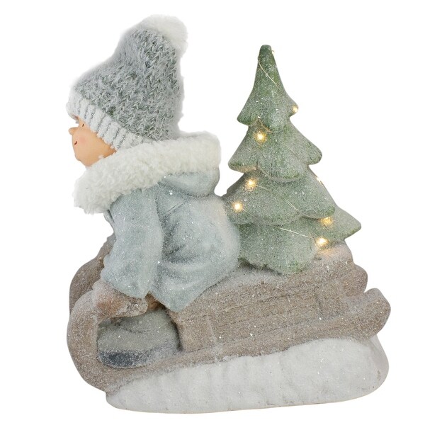 Lighted Boy on a Sled with Tree Christmas Decoration