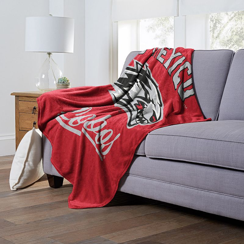 The Northwest New Mexico Lobos Alumni Silk-Touch Throw Blanket