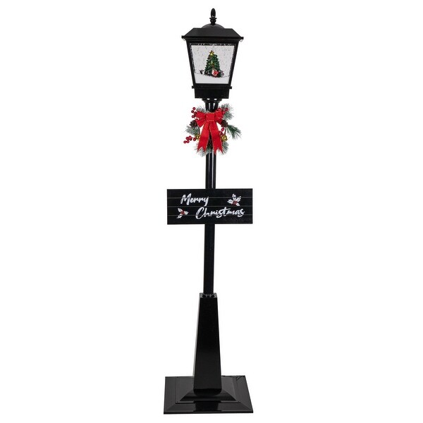 70.75 Lighted Musical Snowing Santa and Friends Christmas Street Lamp