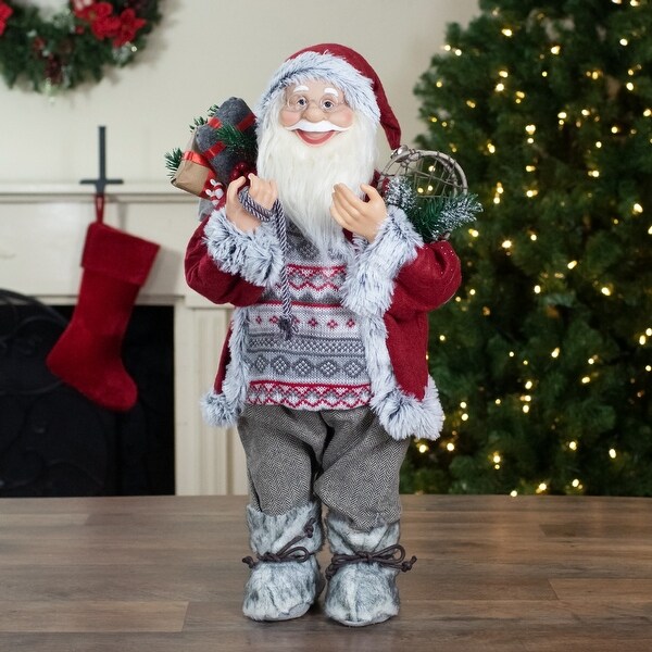 2' Standing Santa Christmas Figure Carrying Snow Shoes and Presents