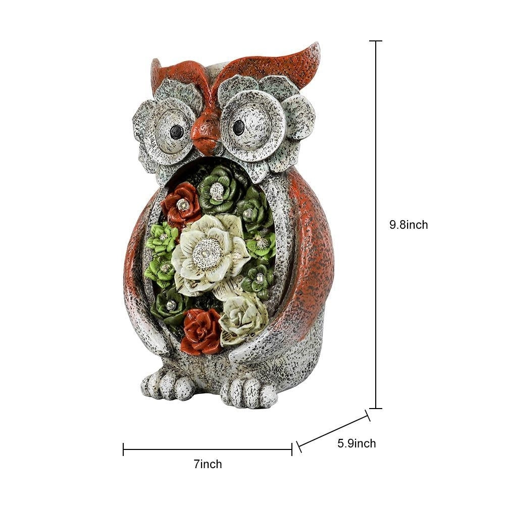 Garden owl statue