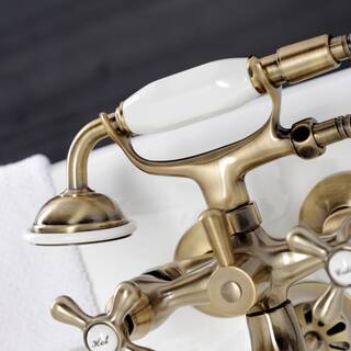 Kingston Brass Kingston 2-Handle Wall-Mount Clawfoot Tub Faucets with Handshower in Antique Brass HKS225AB