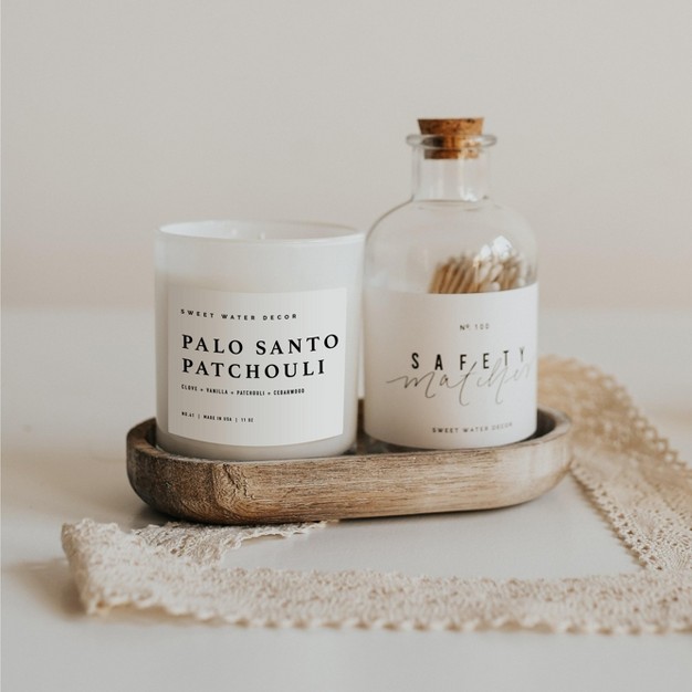 Sweet Water Decor Palo Santo Patchouli 11oz White Jar Soy Candle