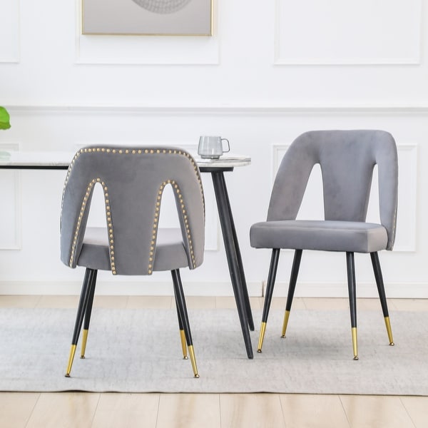 Contemporary Velvet Upholstered Dining Chair with Nailheads and Gold Tipped Black Metal Legs Set of 2