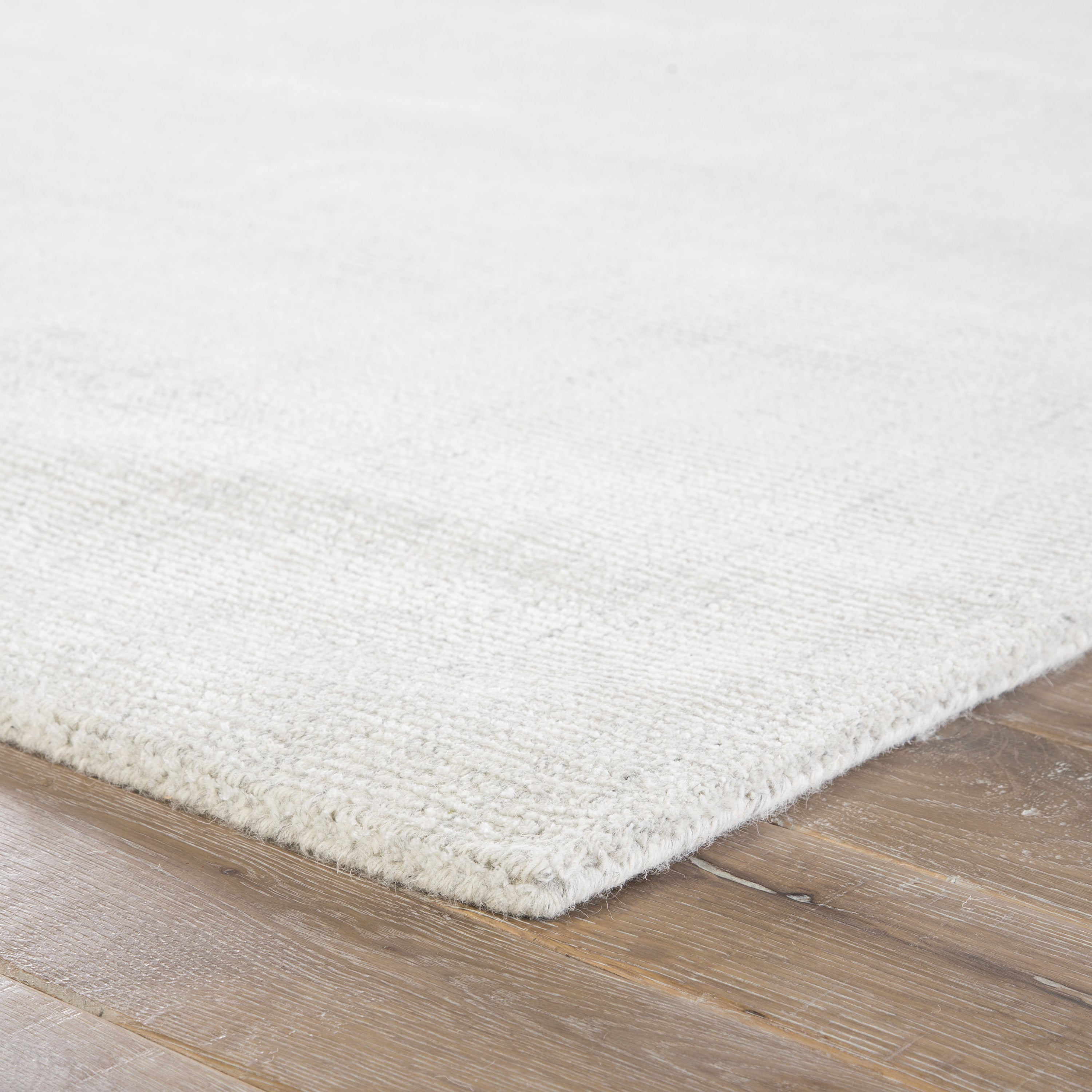 Kelle Handmade Solid White & Gray Area Rug