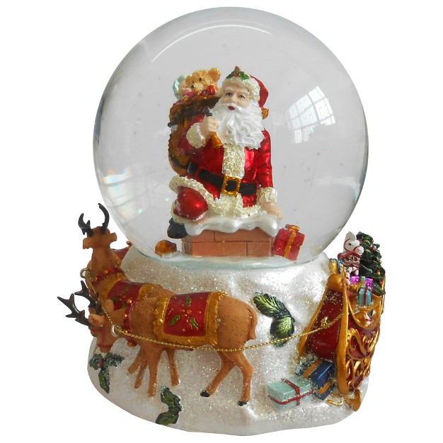 Santa Going Down The Chimney Musical Christmas Snow Globe