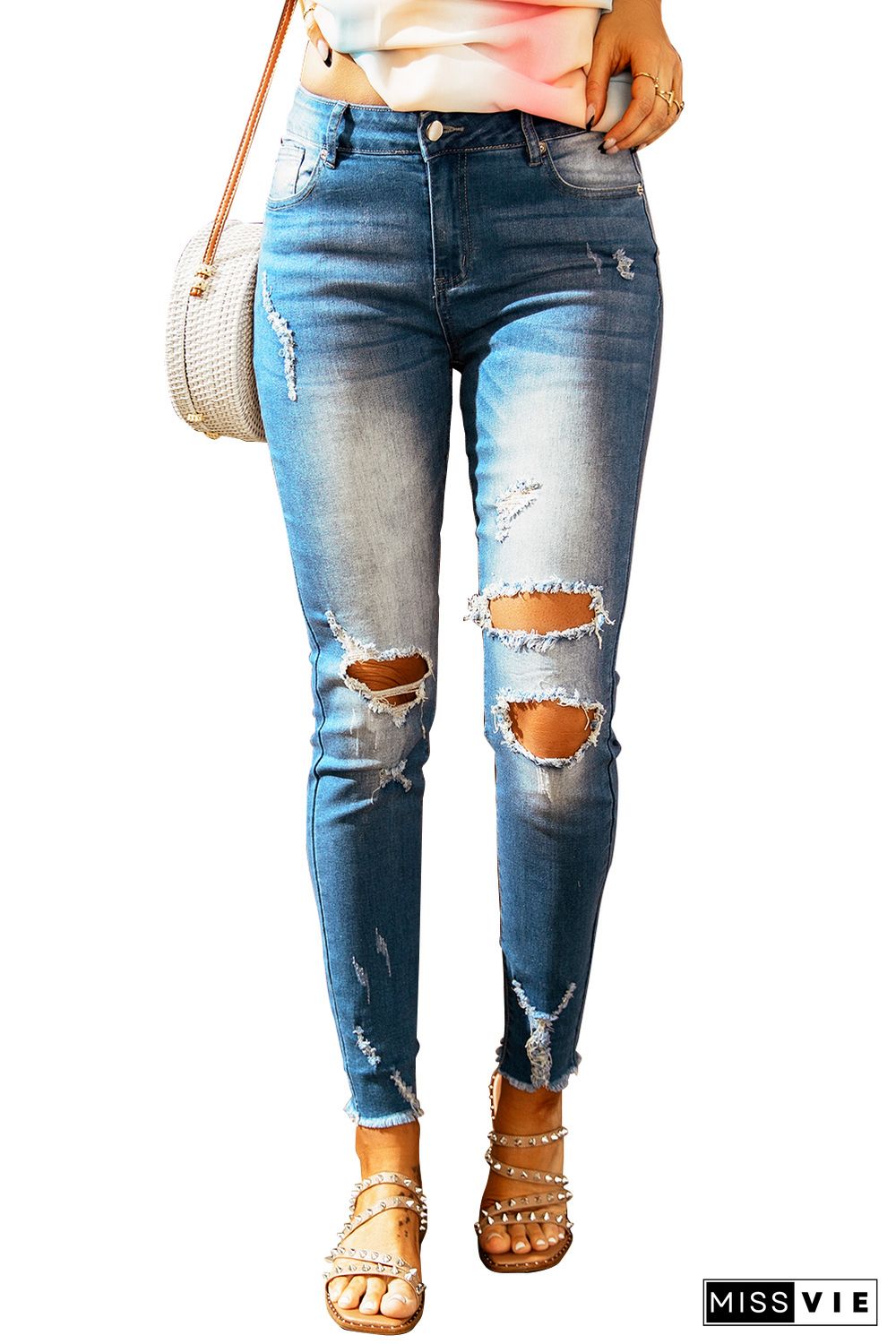 Faded Mid High Rise Jeans with Holes