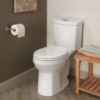 American Standard Cadet 3 in. Tall Height 2-piece 1.0 1.6 GPF Dual Flush Elongated Toilet in White Seat Included 3380.216ST.020