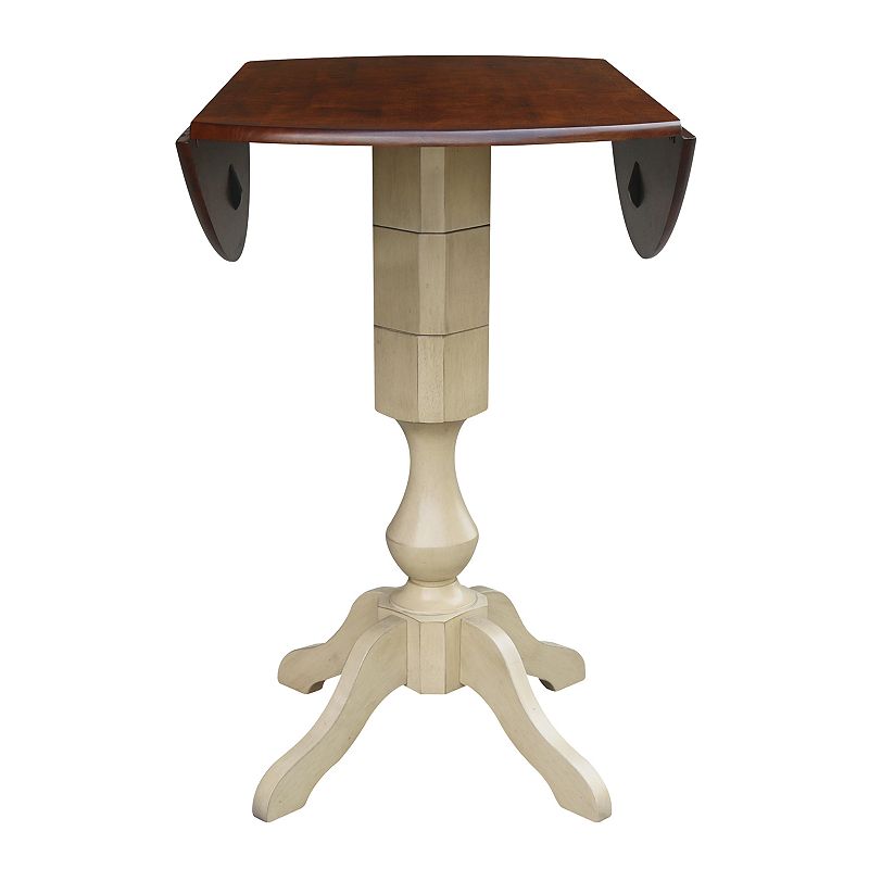 International Concepts Round Dual Drop Leaf Pedestal Dining Table