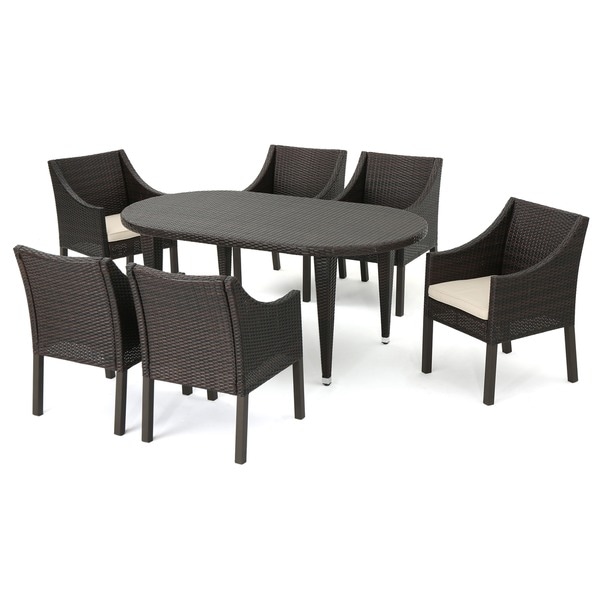 Benjamin Outdoor 7piece Oval Wicker Dining Set with Cushions by Christopher Knight Home