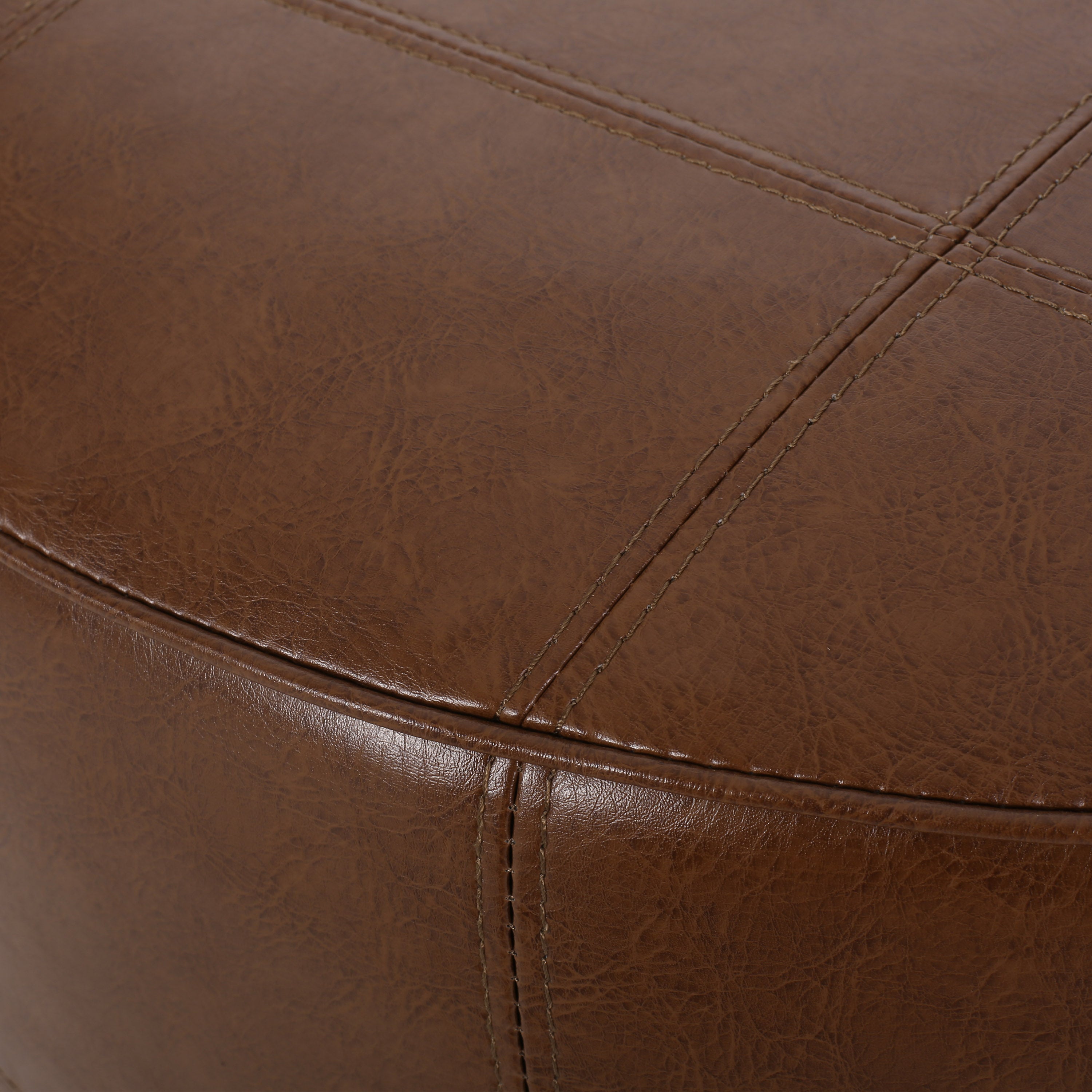 Dored Faux Leather Upholstered Ottoman