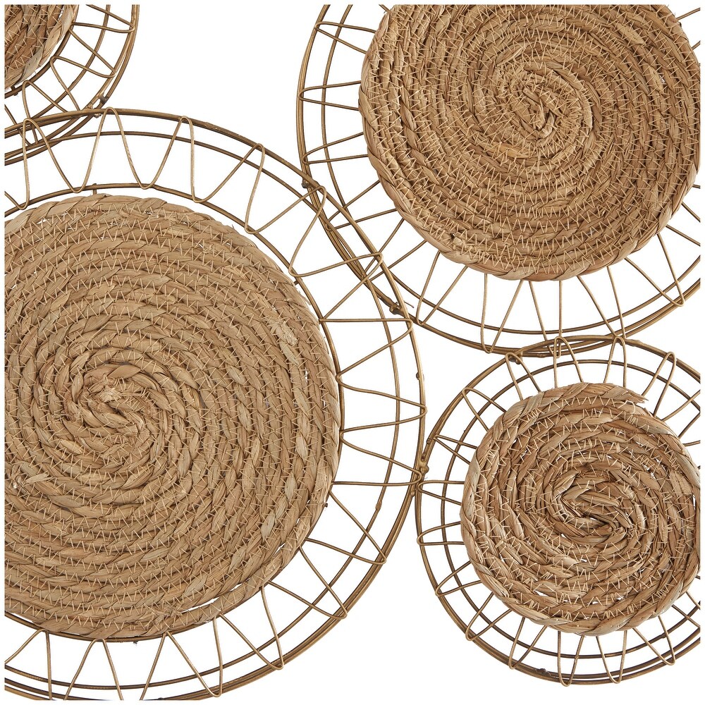 The Novogratz Brown Dried Plant Handmade Woven Plate Wall Decor with Intricate Patterns