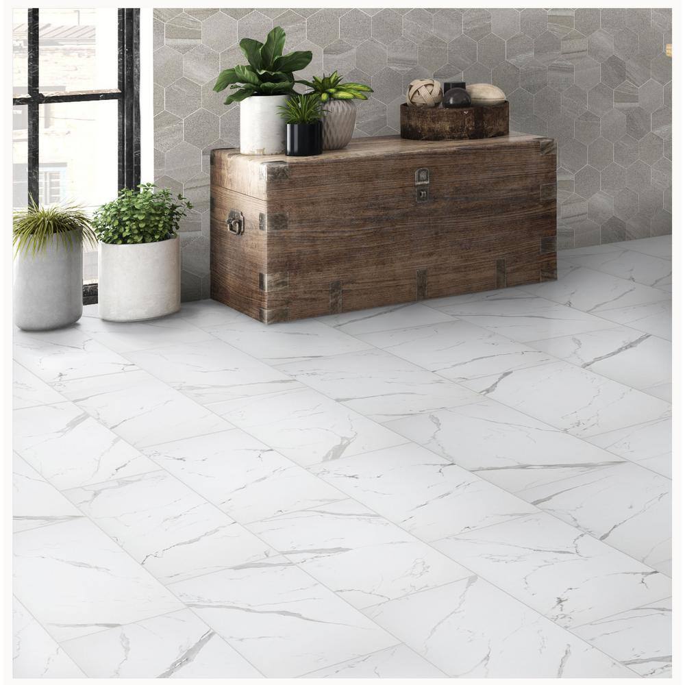 Florida Tile Home Collection Carrara Matte Rectified 12 in. x 24 in. Porcelain Floor and Wall Tile (13.3 sq. ft. case) CHDEAJ0212X24