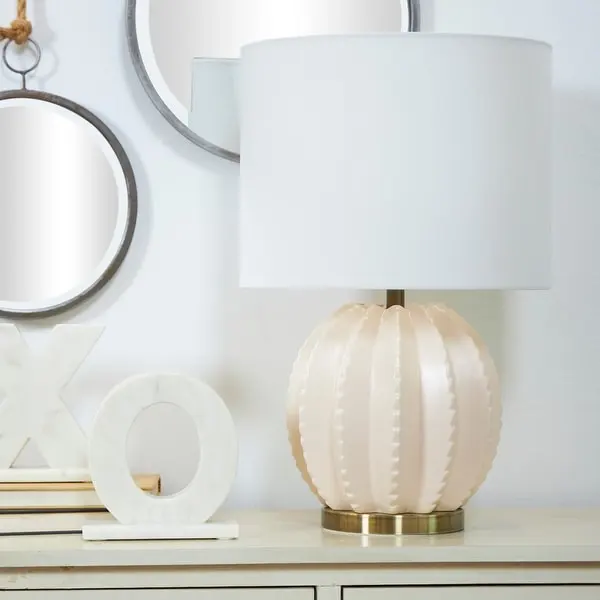 CosmoLiving by Cosmopolitan Cream Ceramic Base Table Lamp