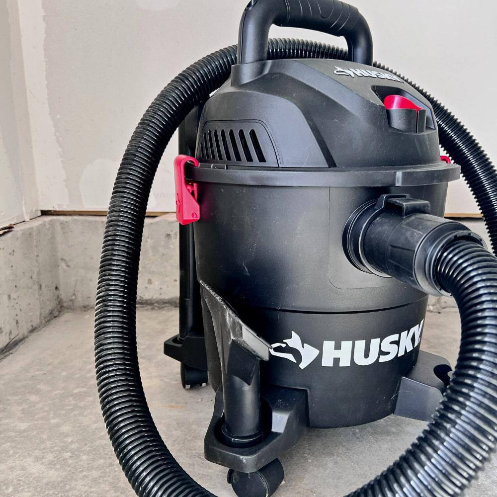 Husky 4 Gal. Poly WetDry Vac with Filter Hose and Accessories AT18303P-4A