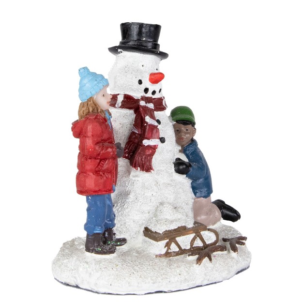 Northlight Children Build A Snowman Christmas Village Display